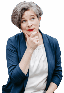 Katrin hält Daumen und Zeigefinger nachdenklich ans Kinn. Der Blick ist noch oben gerichtet.